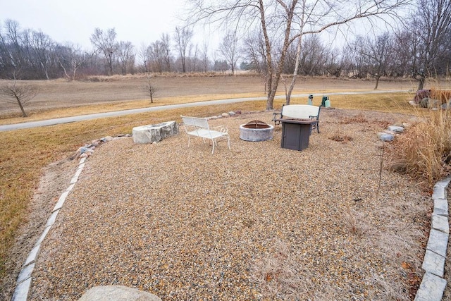 view of yard with a rural view