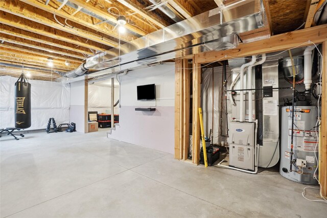 basement with gas water heater and heating unit