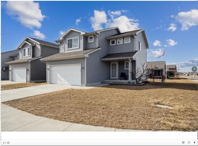 view of front of house featuring a garage and concrete driveway