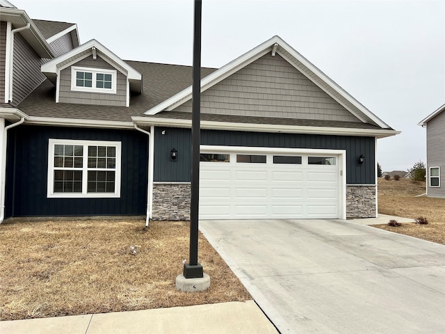 craftsman-style house with a garage