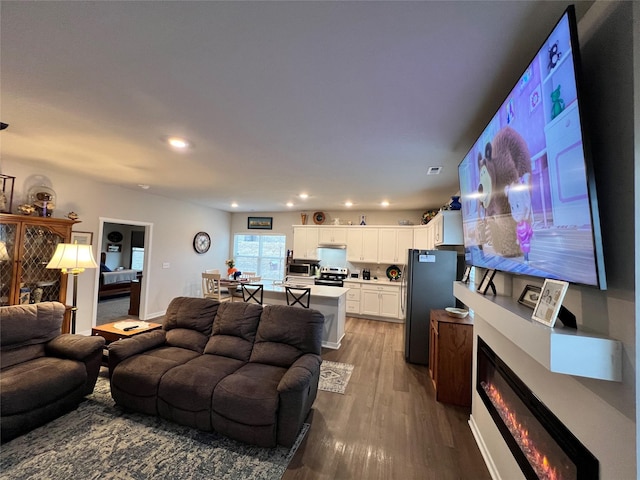 living room with hardwood / wood-style flooring