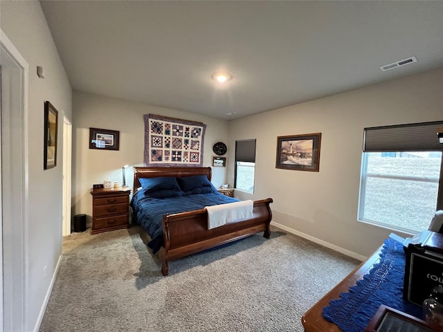 bedroom with light carpet