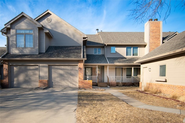 view of front of house featuring a garage and covered porch