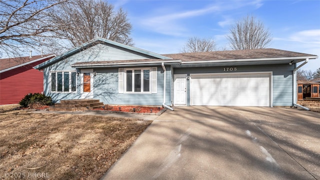 single story home featuring a garage