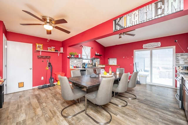 dining space featuring ceiling fan and light hardwood / wood-style floors