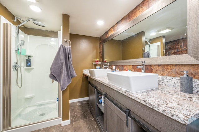 bathroom with walk in shower, vanity, and tasteful backsplash