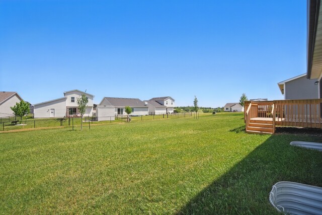 1927 Tuscany Dr SE, Altoona, IA 50009 - view of yard featuring a deck and a residential view
