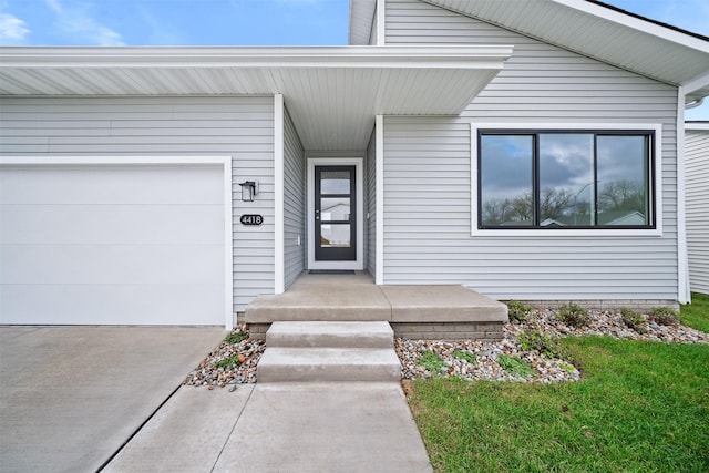 entrance to property with a garage