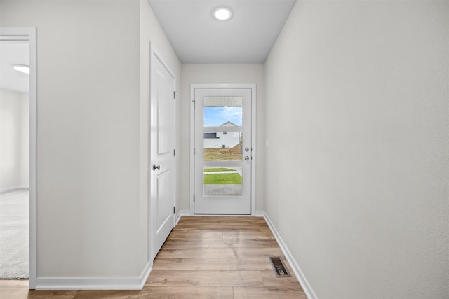 entryway with light hardwood / wood-style flooring