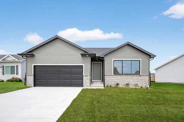 1835 Tuscany Dr SE, Altoona, IA 50009 - ranch-style house featuring stone siding, an attached garage, concrete driveway, and a front lawn
