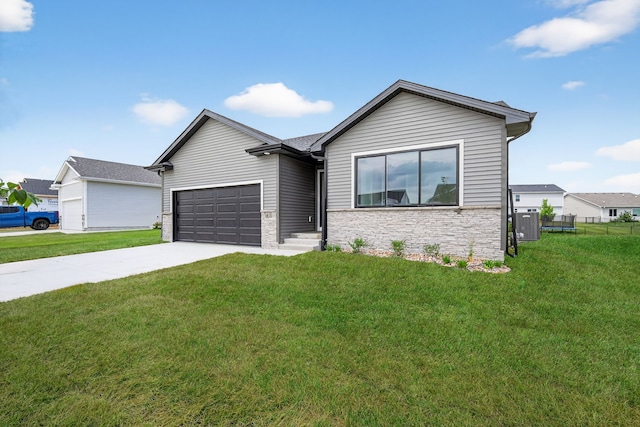 1835 Tuscany Dr SE, Altoona, IA 50009 - single story home with driveway, a garage, and stone siding