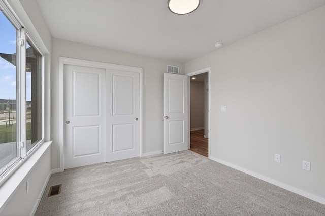 1835 Tuscany Dr SE, Altoona, IA 50009 - unfurnished bedroom with carpet floors and a closet