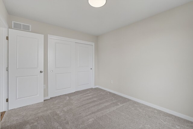 1835 Tuscany Dr SE, Altoona, IA 50009 - unfurnished bedroom with carpet floors and a closet