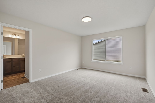 1835 Tuscany Dr SE, Altoona, IA 50009 - unfurnished bedroom featuring carpet and ensuite bathroom
