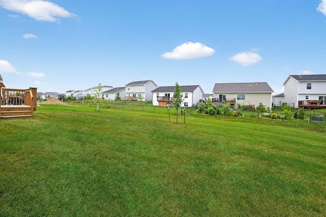 1835 Tuscany Dr SE, Altoona, IA 50009 - view of yard with a residential view and a wooden deck