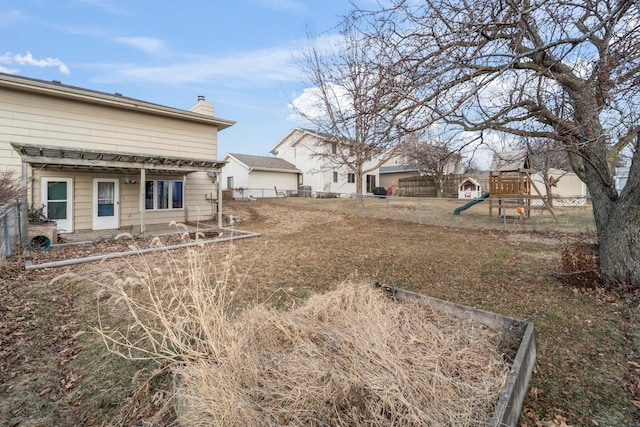 view of yard with a playground