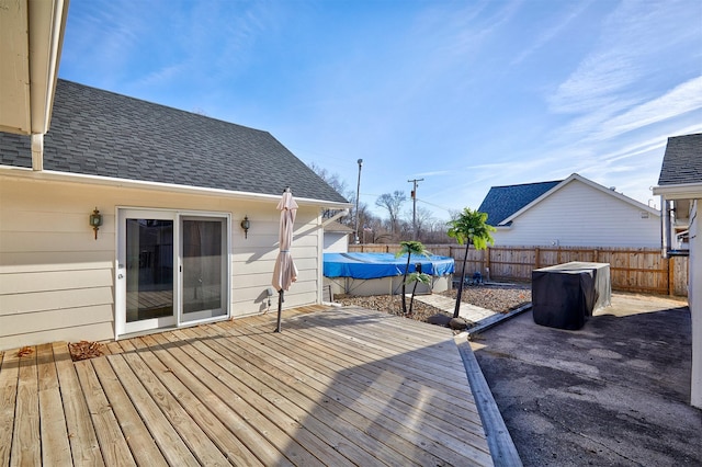 deck with a covered pool