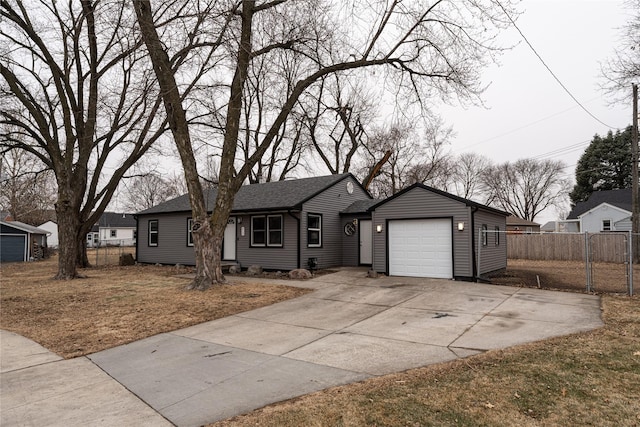 single story home with a garage and a front yard