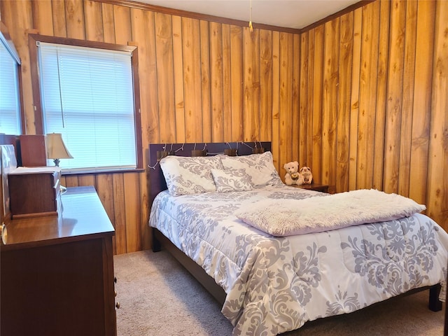 carpeted bedroom with wooden walls