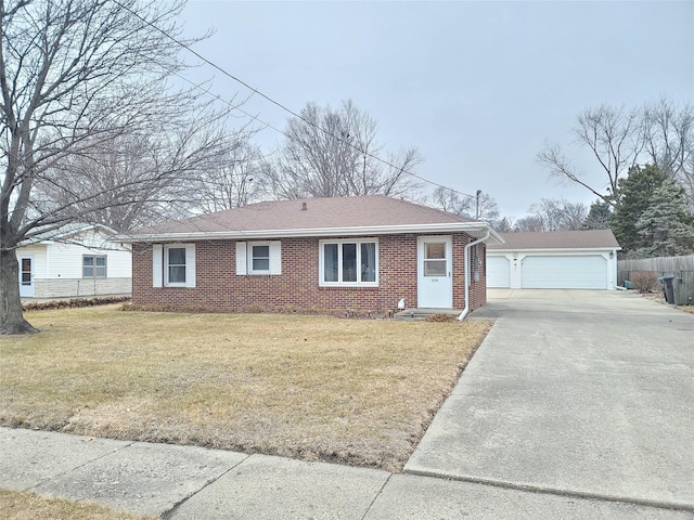 ranch-style home with a garage and a front yard