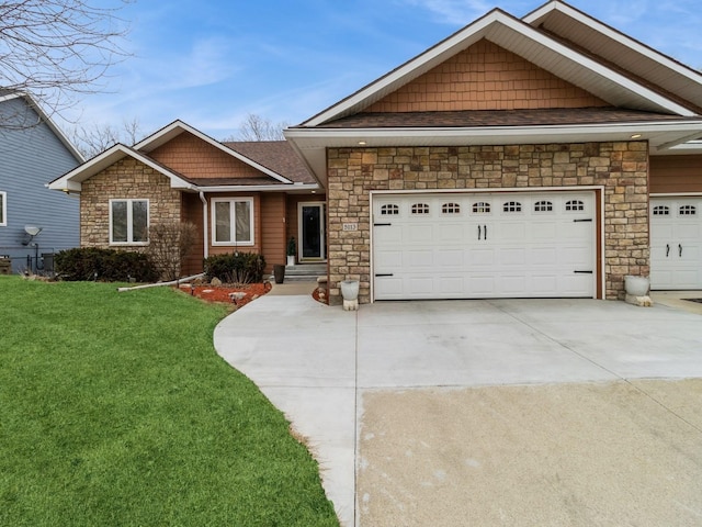 view of front of house featuring a garage and a front yard