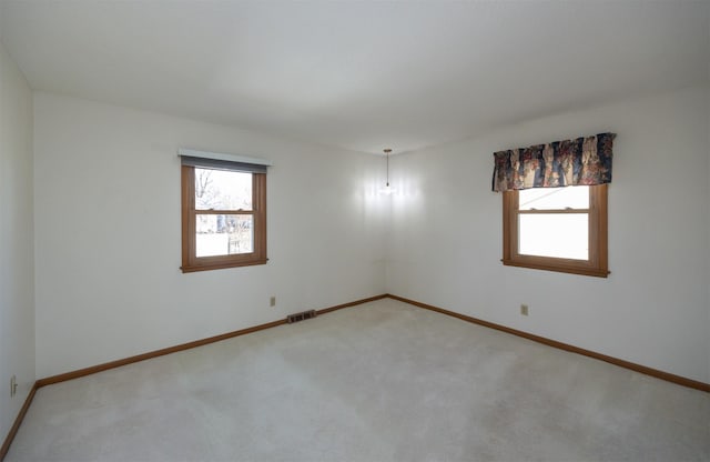 view of carpeted spare room