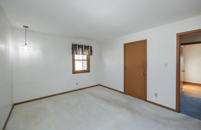 empty room with carpet flooring