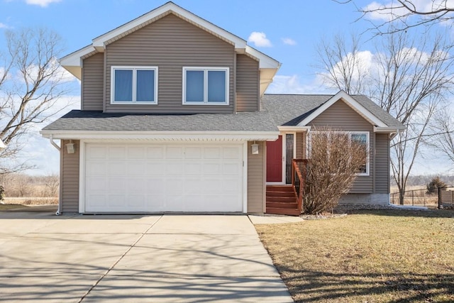 view of front facade featuring a garage and a front yard