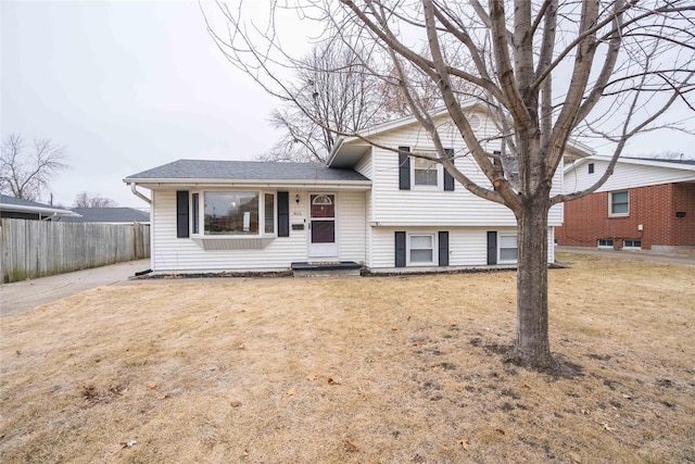 split level home with a front yard