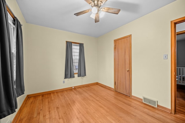 unfurnished bedroom featuring ceiling fan and light hardwood / wood-style floors