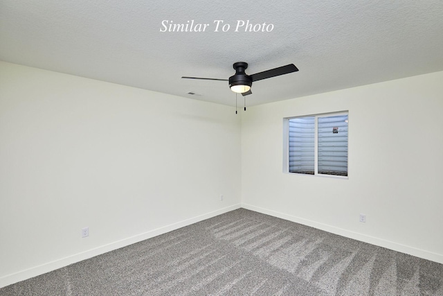 empty room with visible vents, baseboards, ceiling fan, a textured ceiling, and dark carpet