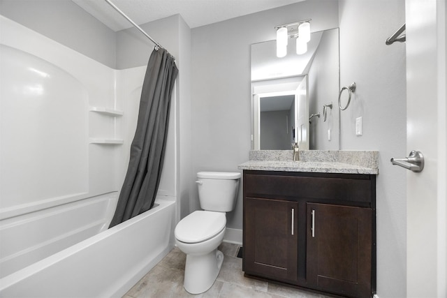 full bathroom with vanity, tile patterned floors, toilet, and shower / bath combo with shower curtain