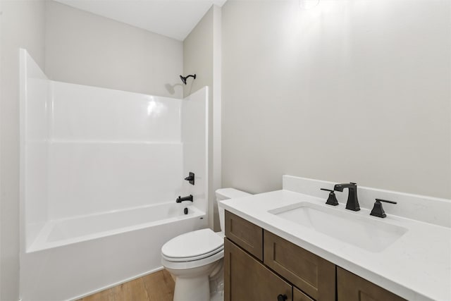 741 Richland Ct, Van Meter, IA 50261 - full bath with vanity, wood finished floors, and bathing tub / shower combination