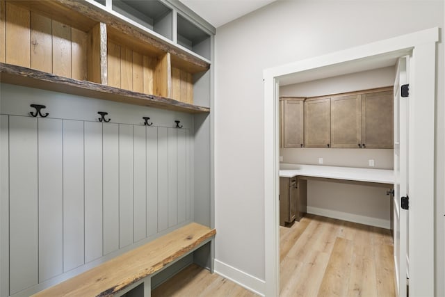 741 Richland Ct, Van Meter, IA 50261 - mudroom with light wood finished floors and built in desk