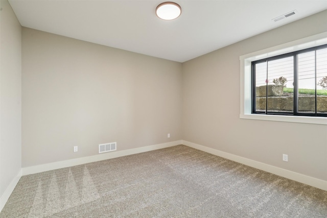 741 Richland Ct, Van Meter, IA 50261 - spare room featuring carpet flooring