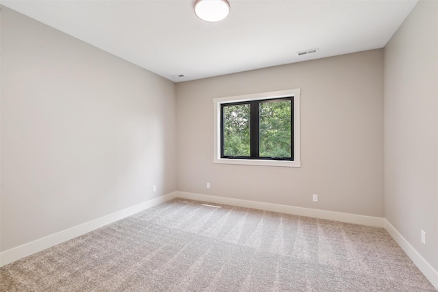741 Richland Ct, Van Meter, IA 50261 - carpeted spare room featuring baseboards