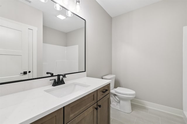741 Richland Ct, Van Meter, IA 50261 - bathroom featuring vanity and a shower