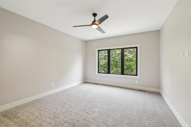 741 Richland Ct, Van Meter, IA 50261 - empty room with carpet floors and a ceiling fan