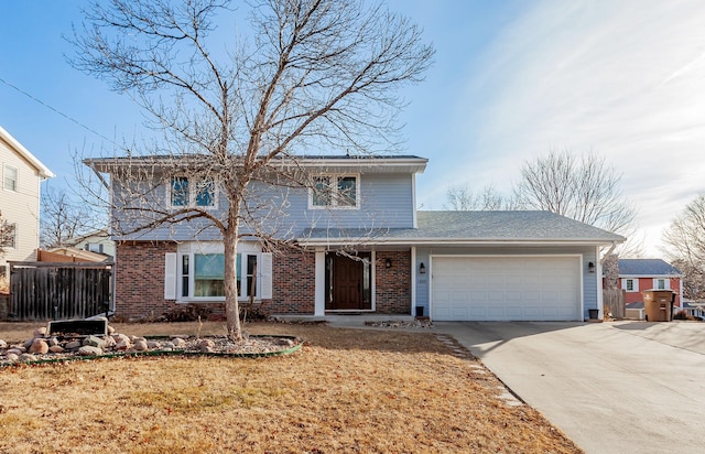 front facade featuring a garage and a front lawn