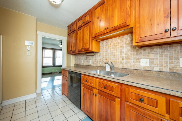 kitchen with dishwasher, sink, decorative backsplash, and light tile patterned floors