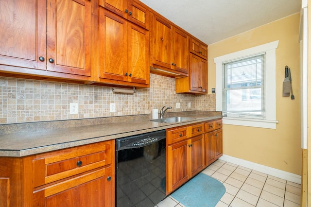 kitchen featuring sink, backsplash, light tile patterned floors, and black dishwasher