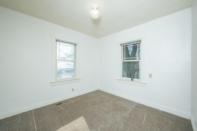 view of carpeted spare room