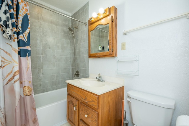 full bathroom featuring vanity, shower / bath combo, and toilet