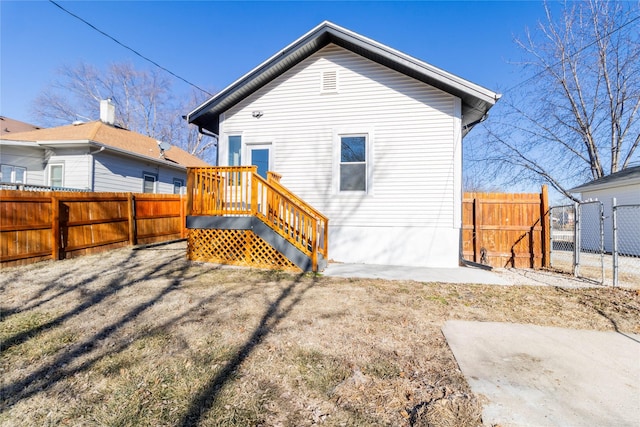 rear view of house with a patio