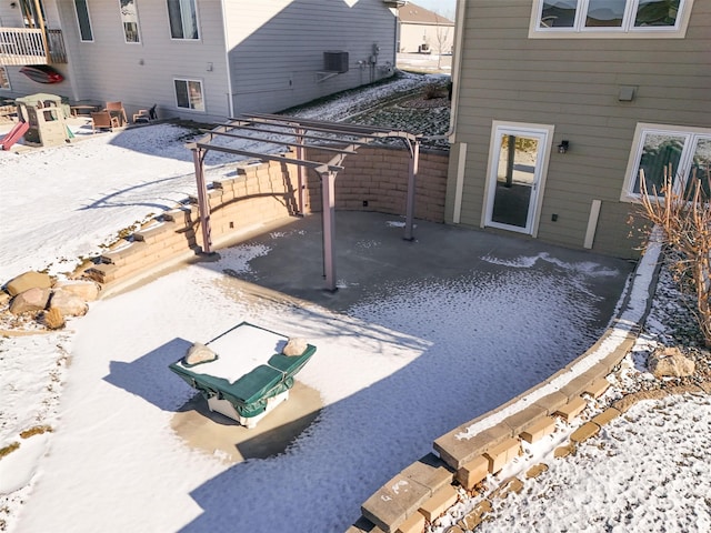 view of snow covered patio