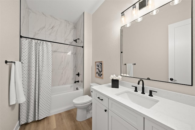 full bathroom with hardwood / wood-style flooring, vanity, toilet, and shower / bath combo with shower curtain