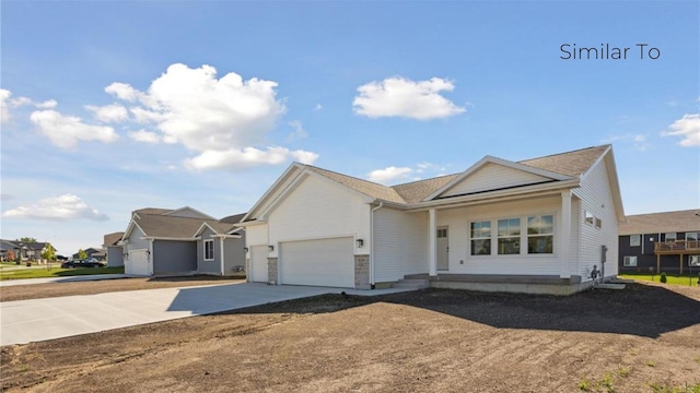 ranch-style home with a garage