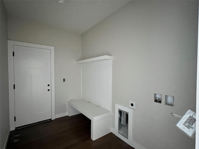 laundry area featuring laundry area, dark wood finished floors, hookup for an electric dryer, and hookup for a washing machine