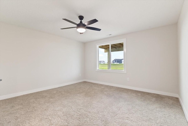 625 NW Georgetown Dr, Waukee, IA 50263 - carpeted empty room featuring baseboards and a ceiling fan