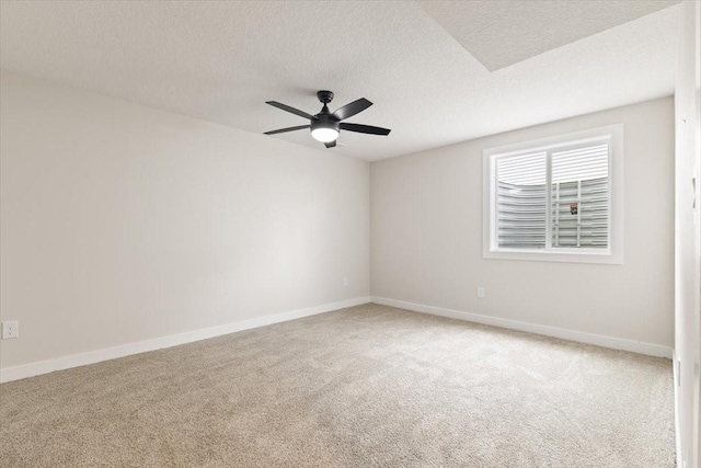 625 NW Georgetown Dr, Waukee, IA 50263 - unfurnished room with carpet, a ceiling fan, and a textured ceiling